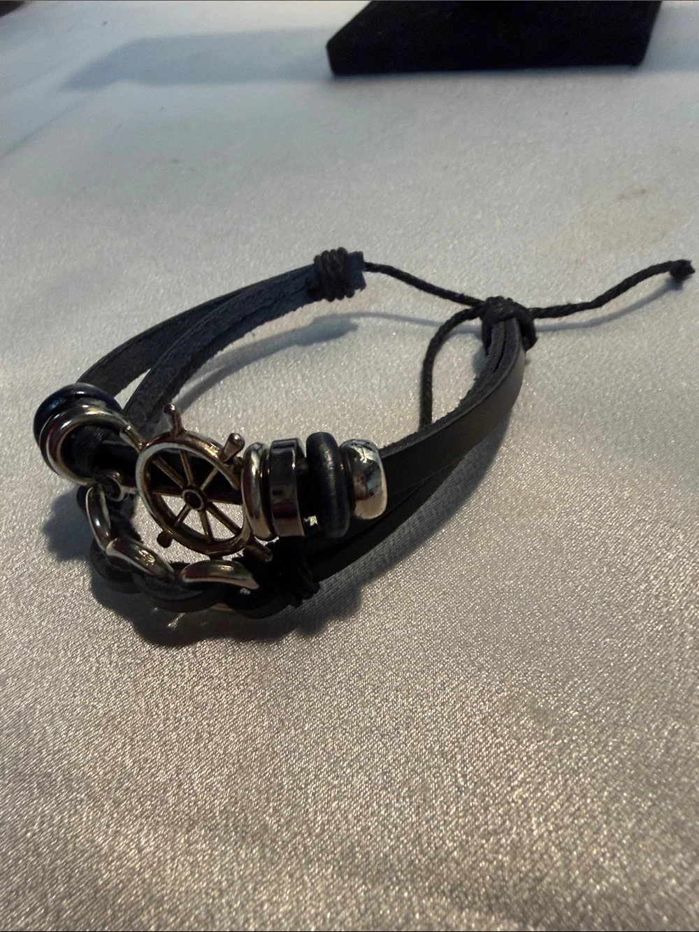 Source Unknown Black Leather Wrap Bracelet with Silver Nautical Wheel
